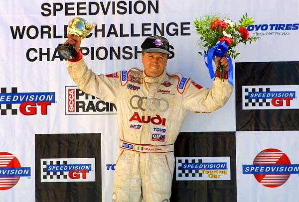 Michael Galati celebrating on the Speedvision World Challenge championship podium
